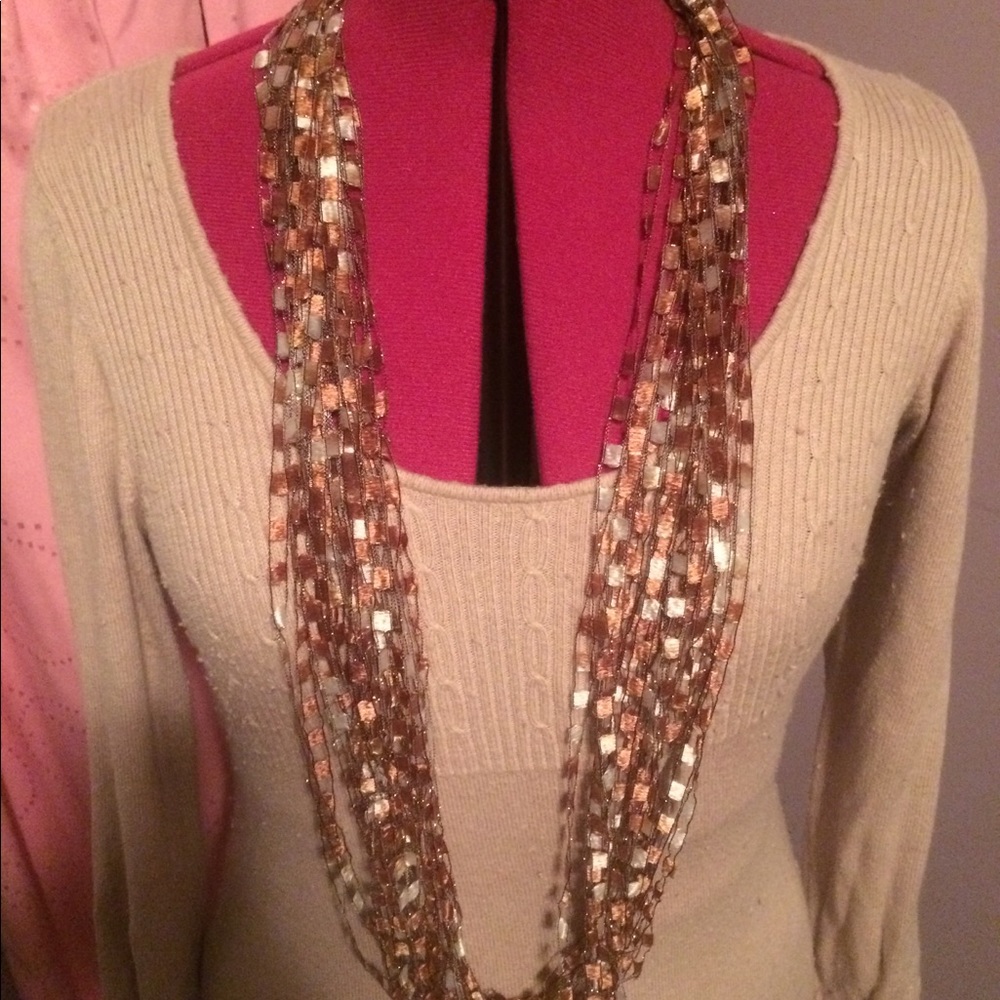 Soft scarf with sparkle very versatile Botique